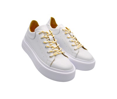 Білі класичні кросівки з жовтим підкладом 