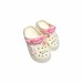 Крокси молочні з рожевим з джибітсами Babyshop